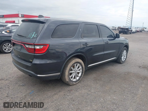2014 Dodge Durango SXT with VIN 1C4RDJAG7EC307118, listed as a IAAI auction lot 42168781 with 92,977 mi miles and . Bid and sale history available at DreamBid. Image 4.