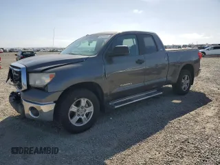 2012 Toyota Tundra with VIN 5TFRM5F1XCX037111, listed as a Copart auction lot 54534145 with 294,109 mi miles and Salvage title. Bid and sale history available at DreamBid. Image 1.