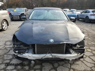 2018 BMW 7 Series 740i with VIN WBA7E2C58JG743269, listed as a Copart auction lot 84905044 with 74,951 mi miles and Salvage Title. Bid and sale history available at carsss.com. Image 5.