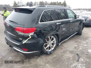 2019 Jeep Grand Cherokee Summit with VIN 1C4RJFJGXKC669686, listed as a IAAI auction lot 41465553 with 72,127 mi miles. Bid and sale history available at carsss.com. Image 4.
