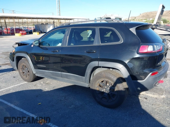 2019 Jeep Cherokee Trailhawk with VIN 1C4PJMBX1KD441175, listed as a IAAI auction lot 42506246 with 47,760 mi miles and . Bid and sale history available at DreamBid. Image 14.