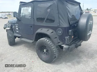 1997 Jeep Wrangler Sport with VIN 1J4FY19S2VP481780, listed as a IAAI auction lot 41822213 with 156,629 mi miles. Bid and sale history available at carsss.com. Image 3.