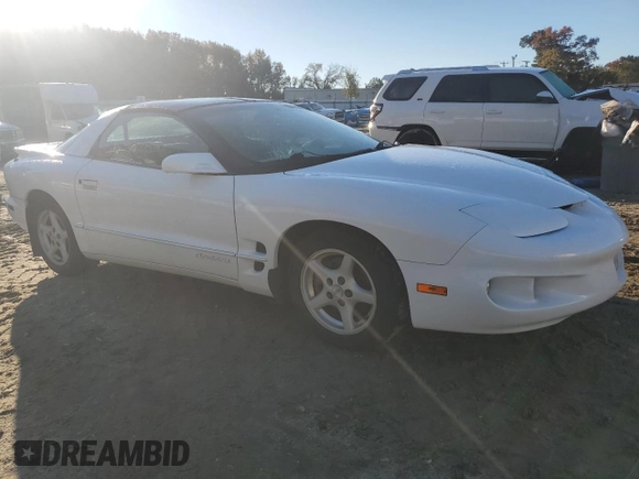 2001 Pontiac Firebird Firebird z VIN 2G2FS22K912106238, wystawiony jako Copart lot #80277164 z przebiegiem 139 896 mil mil oraz Czysty tytuł • Clean title. Historia ofert i sprzedaży dostępna na DreamBid. Obrazek 4.