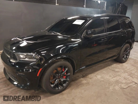 2023 Dodge Durango R/T Plus with VIN 1C4SDJCT8PC571642, listed as a IAAI auction lot 42093743 with 33,631 mi miles and . Bid and sale history available at DreamBid. Image 18.