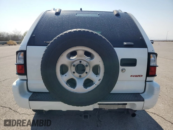 2000 Isuzu Rodeo S with VIN 4S2DM58WXY4302769, listed as a Copart auction lot 70416054 with 150,621 mi miles and Salvage Title. Bid and sale history available at DreamBid. Image 6.