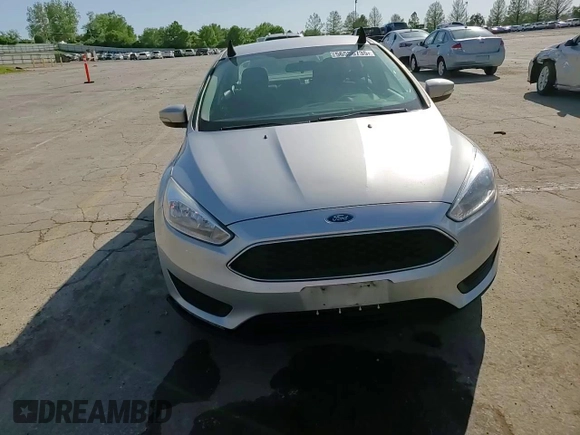 2017 Ford Focus SE z VIN 1FADP3F29HL339332, wystawiony jako Copart lot #56556735 z przebiegiem 93 050 mil mil oraz Szkoda całkowita • Salvage title. Historia ofert i sprzedaży dostępna na DreamBid. Obrazek 13.