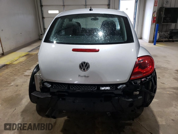 2016 Volkswagen Beetle Wolfsburg Edition with VIN 3VWF17AT3GM602307, listed as a Copart auction lot 56144965 with 63,317 mi miles and Salvage Title. Bid and sale history available at DreamBid. Image 6.