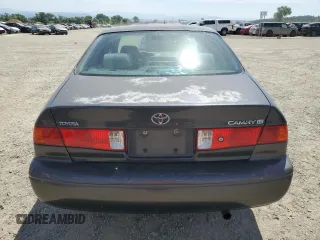 2001 Toyota Camry CE z VIN 4T1BG22K61U780042, wystawiony jako Copart lot #58605455 z przebiegiem 163 833 mil mil oraz Szkoda całkowita • Salvage title. Historia ofert i sprzedaży dostępna na DreamBid. Obrazek 6.