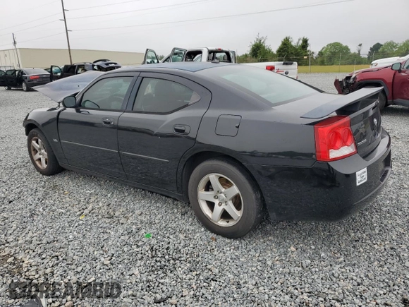 2010 Dodge Charger SXT with VIN 2B3CA3CV3AH197361, listed as a Copart auction lot 54831815 with 140,753 mi miles and Salvage Title. Bid and sale history available at DreamBid. Image 2.