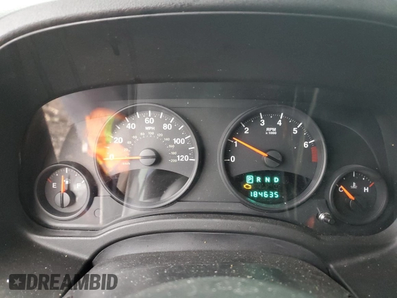 2013 Jeep Patriot Latitude with VIN 1C4NJPFB1DD255761, listed as a Copart auction lot 52772015 with 184,635 mi miles and Salvage Title. Bid and sale history available at carsss.com. Image 9.