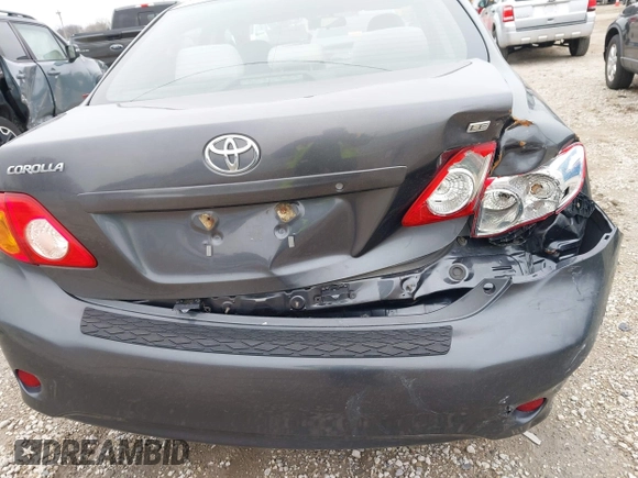 2009 Toyota Corolla with VIN 1NXBU40E99Z138136, listed as a IAAI auction lot 41967052 with 207,892 mi miles. Bid and sale history available at carsss.com. Image 6.