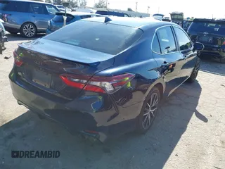 2021 Toyota Camry SE Nightshade with VIN 4T1G11AK6MU526029, listed as a IAAI auction lot 41626272 with 82,987 mi miles and . Bid and sale history available at DreamBid. Image 4.
