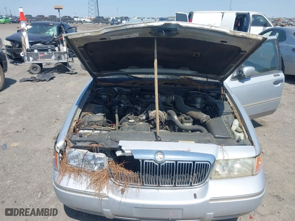2002 Mercury Grand Marquis LS Premium with VIN 2MEFM75W02X660966, listed as a IAAI auction lot 41869806 with 133,758 mi miles. Bid and sale history available at carsss.com. Image 10.