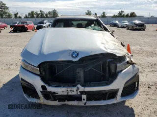 2022 BMW 7 Series with VIN WBA7W4C06NCJ99199, listed as a Copart auction lot 67928902 with Not provided miles and . Bid and sale history available at DreamBid. Image 5.