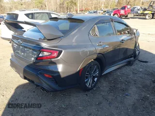 2022 Subaru WRX z VIN JF1VBAB65N8018712, wystawiony jako IAAI lot #41226618 z przebiegiem 24 309 mil mil oraz . Historia ofert i sprzedaży dostępna na DreamBid. Obrazek 4.