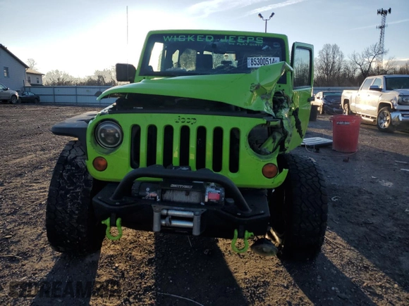 2013 Jeep Wrangler Rubicon 10th Anniversary with VIN 1C4BJWCG0DL506174, listed as a Copart auction lot 85300514 with 133,974 mi miles and Salvage Title. Bid and sale history available at DreamBid. Image 5.
