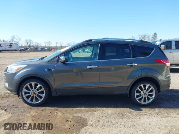 2015 Ford Escape SE with VIN 1FMCU9G97FUA89251, listed as a IAAI auction lot 41919240 with 148,472 mi miles and . Bid and sale history available at DreamBid. Image 14.
