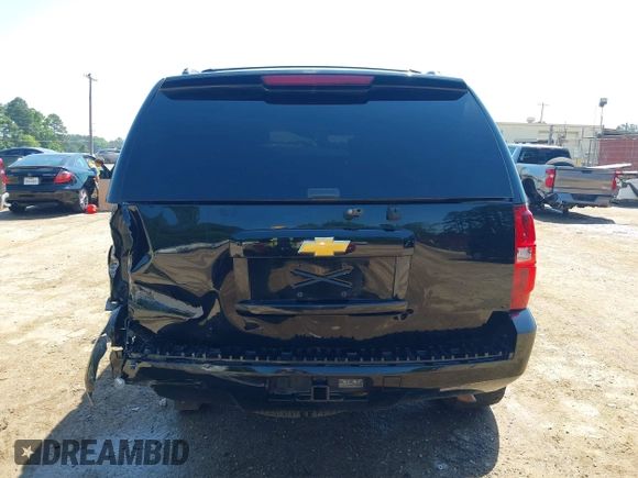 2013 Chevrolet Tahoe LS with VIN 1GNSCAE06DR263469, listed as a IAAI auction lot 42245636 with 240,506 mi miles and . Bid and sale history available at DreamBid. Image 18.