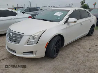 2013 Cadillac XTS Platinum z VIN 2G61U5S3XD9208737, wystawiony jako IAAI lot #41928451 z przebiegiem 167 984 mil mil oraz . Historia ofert i sprzedaży dostępna na DreamBid. Obrazek 17.