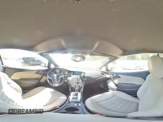2016 Buick Cascada Premium с VIN W04WT3N58GG037011, выставлен на аукционе Copart как лот 52629625 с пробегом 78 576 миль миль и Списание • Salvage title. История ставок и продаж доступна на DreamBid. Изображение 13.