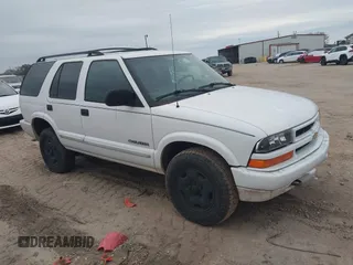 2004 Chevrolet Blazer LS z VIN 1GNDT13X34K157711, wystawiony jako IAAI lot #41282289 z przebiegiem 148 013 mil mil oraz . Historia ofert i sprzedaży dostępna na DreamBid. Obrazek 1.