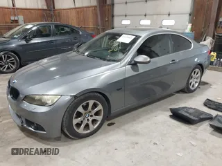 2007 BMW 3 Series 328xi with VIN WBAWC33517PC87084, listed as a IAAI auction lot 41611461 with 196,537 mi miles and . Bid and sale history available at DreamBid. Image 2.