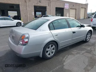 2002 Nissan Altima S with VIN 1N4AL11D62C717139, listed as a IAAI auction lot 41569217 with 135,200 mi miles. Bid and sale history available at carsss.com. Image 4.