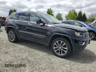 2018 Jeep Grand Cherokee Limited with VIN 1C4RJFBG8JC106374, listed as a Copart auction lot 58212965 with 61,813 mi miles and Salvage title. Bid and sale history available at DreamBid. Image 4.