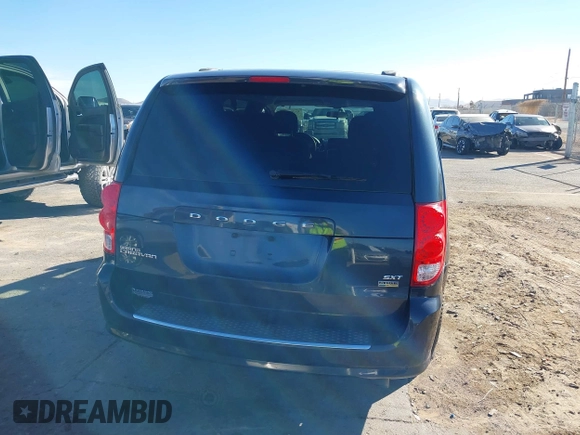 2014 Dodge Grand Caravan SXT 30th Anniversary with VIN 2C4RDGCG0ER264152, listed as a IAAI auction lot 41506760 with 144,903 mi miles and . Bid and sale history available at DreamBid. Image 16.