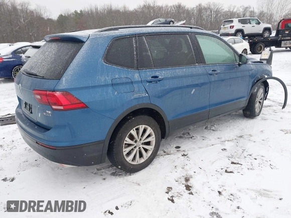 2018 Volkswagen Tiguan S z VIN 3VV0B7AX8JM081263, wystawiony jako IAAI lot #41245308 z przebiegiem 58 778 mil mil oraz . Historia ofert i sprzedaży dostępna na DreamBid. Obrazek 4.