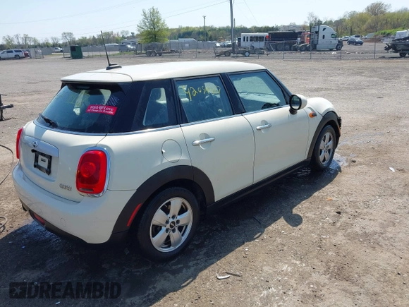 2015 MINI Hardtop 4 Door with VIN WMWXS5C53FT832742, listed as a IAAI auction lot 42059417 with 114,671 mi miles and . Bid and sale history available at DreamBid. Image 4.