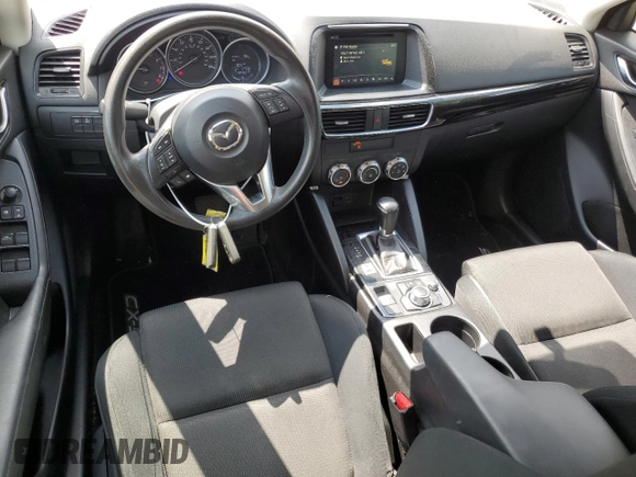 2016 Mazda CX-5 Sport z VIN JM3KE2BY4G0632946, wystawiony jako Copart lot #61447435 z przebiegiem 178 492 mil mil oraz Szkoda całkowita • Salvage title. Historia ofert i sprzedaży dostępna na DreamBid. Obrazek 8.