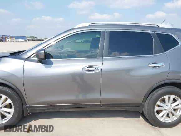 2016 Nissan Rogue S with VIN JN8AT2MT2GW025523, listed as a IAAI auction lot 41960371 with 73,965 mi miles and . Bid and sale history available at DreamBid. Image 14.