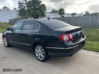 2010 Volkswagen Passat Sedan Komfort with VIN WVWJK7AN5AE140745, listed as a Copart auction lot 77474744 with 174,409 mi miles and Clean Title. Bid and sale history available at carsss.com. Image 3.