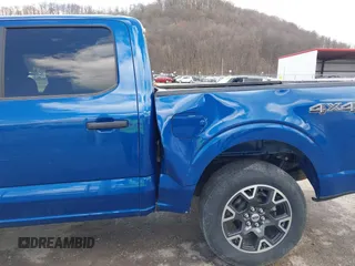 2024 Ford F-150 STX with VIN 1FTEW2LPXRFA56269, listed as a IAAI auction lot 41894302 with 12,941 mi miles and . Bid and sale history available at carsss.com. Image 18.