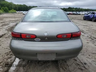 1999 Mercury Sable LS with VIN 1MEFM53U6XG646248, listed as a Copart auction lot 57859405 with 128,286 mi miles and Salvage title. Bid and sale history available at DreamBid. Image 6.