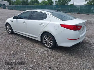 2014 Kia Optima SX Turbo with VIN 5XXGR4A69EG281560, listed as a IAAI auction lot 42366130 with 178,227 mi miles and . Bid and sale history available at DreamBid. Image 3.