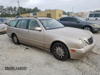 2001 Mercedes-Benz E-Class with VIN WDBJH65J41B312277, listed as a Copart auction lot 70261594 with 123,702 mi miles and Clean Title. Bid and sale history available at carsss.com. Image 4.