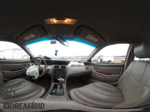 2004 Toyota Avalon XL with VIN 4T1BF28B84U384211, listed as a IAAI auction lot 41925260 with 122,669 mi miles and . Bid and sale history available at DreamBid. Image 18.