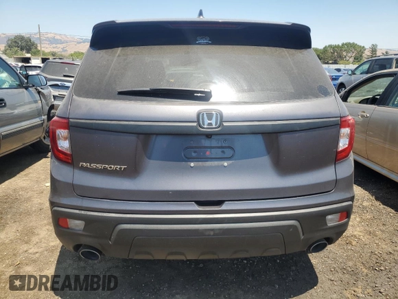 2021 Honda Passport EX-L with VIN 5FNYF7H5XMB013999, listed as a Copart auction lot 61893804 with 52,859 mi miles and Salvage Title. Bid and sale history available at carsss.com. Image 6.