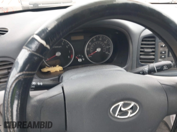 2007 Hyundai Accent GS with VIN KMHCM36CX7U006584, listed as a IAAI auction lot 41801452 with 1 mi miles. Bid and sale history available at carsss.com. Image 15.