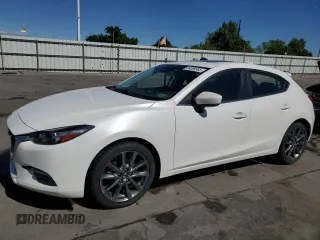 2018 Mazda 3 Touring z VIN 3MZBN1L3XJM173767, wystawiony jako Copart lot #56380585 z przebiegiem 70 798 mil mil oraz Szkoda całkowita • Salvage title. Historia ofert i sprzedaży dostępna na DreamBid. Obrazek 1.