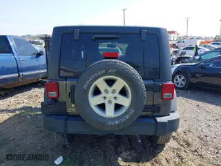2018 Jeep Wrangler JK Unlimited Sport S with VIN 1C4HJWDG2JL886803, listed as a IAAI auction lot 41997238 with 113,926 mi miles. Bid and sale history available at carsss.com. Image 16.