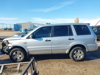 2006 Honda Pilot LX with VIN 2HKYF18156H556689, listed as a IAAI auction lot 40792236 with 273,856 mi miles. Bid and sale history available at carsss.com. Image 15.