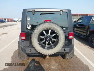2017 Jeep Wrangler Sport with VIN 1C4AJWAG6HL654592, listed as a IAAI auction lot 42447379 with 61,585 mi miles and . Bid and sale history available at DreamBid. Image 16.