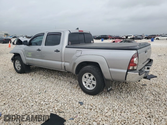 2014 Toyota Tacoma with VIN 3TMMU4FN0EM072840, listed as a Copart auction lot 51740805 with 128,678 mi miles and Salvage title. Bid and sale history available at DreamBid. Image 2.