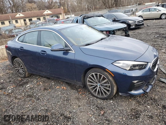 2023 BMW 2 Series 228i xDrive with VIN WBA73AK00P7M34880, listed as a Copart auction lot 77828404 with 8,726 mi miles and Salvage Title. Bid and sale history available at carsss.com. Image 4.