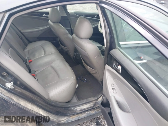 2012 Hyundai Sonata SE z VIN 5NPEC4AC1CH375481, wystawiony jako IAAI lot #42448689 z przebiegiem 138 884 mil mil oraz . Historia ofert i sprzedaży dostępna na DreamBid. Obrazek 8.