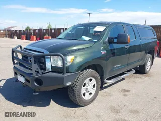2010 Toyota Tundra 4WD Truck with VIN 5TFUW5F11AX103188, listed as a IAAI auction lot 39811998 with 198,948 mi miles. Bid and sale history available at carsss.com. Image 2.