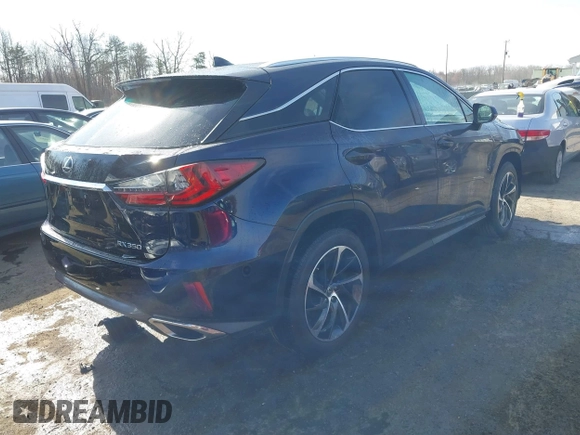 2017 Lexus RX with VIN 2T2BZMCA4HC072746, listed as a IAAI auction lot 41739775 with 54,571 mi miles. Bid and sale history available at carsss.com. Image 4.